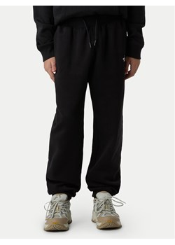 The North Face Spodnie dresowe Essential NF0A8BHS Czarny Regular Fit ze sklepu MODIVO w kategorii Spodnie dziewczęce - zdjęcie 185834052