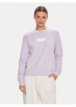 Calvin Klein Jeans Bluza Faded Monologo J20J223537 Fioletowy Regular Fit ze sklepu MODIVO w kategorii Bluzy damskie - zdjęcie 185834081