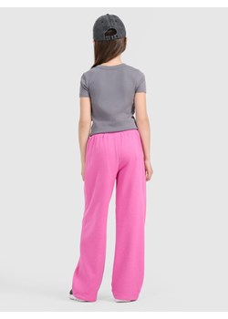 Dziewczęce spodnie dresowe 4F 4FJRAW25TTROF1601 - różowe ze sklepu Sportstylestory.com w kategorii Spodnie dziewczęce - zdjęcie 185854652