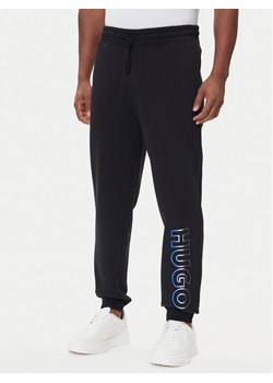 HUGO Spodnie dresowe Nogtro 50549149 Czarny Regular Fit ze sklepu MODIVO w kategorii Spodnie męskie - zdjęcie 185870053