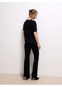 Mohito - Jeansy flare petite - czarny ze sklepu Mohito w kategorii Jeansy damskie - zdjęcie 185884922