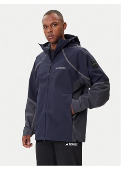 adidas Kurtka przeciwdeszczowa Nat Geo Climaproof KC2343 Granatowy Loose Fit ze sklepu MODIVO w kategorii Kurtki męskie - zdjęcie 185913660