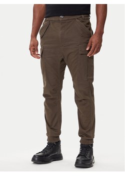 Alpha Industries Joggery Airman 188201 Zielony Tapered Fit ze sklepu MODIVO w kategorii Spodnie męskie - zdjęcie 185914043