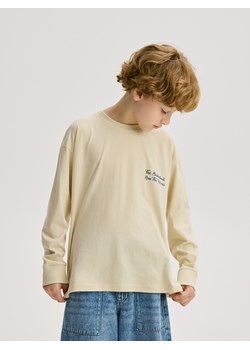 Reserved - Bawełniany longsleeve z nadrukiem - złamana biel ze sklepu Reserved w kategorii T-shirty chłopięce - zdjęcie 185928773