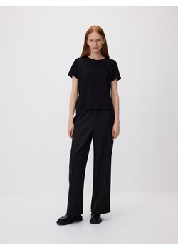 Reserved - T-shirt oversize z aplikacjami - czarny - id: 566GA-99X - marki Reserved - 185940294 Reserved - T-shirt oversize z aplikacjami - czarny ze sklepu Reserved w kategorii Bluzki damskie - zdjęcie 185940294