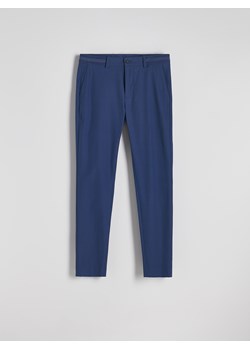 Reserved - Spodnie chino slim fit - niebieski ze sklepu Reserved w kategorii Spodnie męskie - zdjęcie 185941714