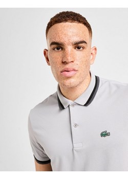 LACOSTE POLO POLO ze sklepu JD Sports  w kategorii T-shirty męskie - zdjęcie 185982174