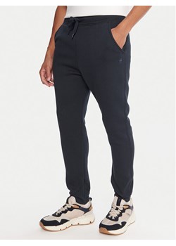 G-Star Raw Spodnie dresowe Premium Core D15653-C235 Granatowy Slim Fit ze sklepu MODIVO w kategorii Spodnie męskie - zdjęcie 186028982