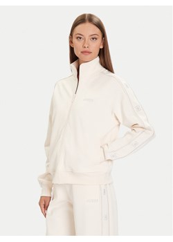 Guess Bluza V5BQ15 KCX22 Beżowy Regular Fit ze sklepu MODIVO w kategorii Bluzy damskie - zdjęcie 186029602