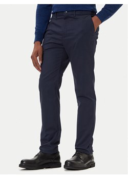 Calvin Klein Chinosy LV04LD613G Granatowy Slim Fit ze sklepu MODIVO w kategorii Spodnie męskie - zdjęcie 186029720