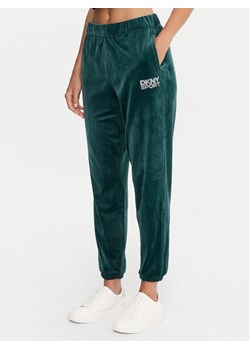 DKNY Sport Spodnie dresowe DP5P3702 Zielony Regular Fit ze sklepu MODIVO w kategorii Spodnie damskie - zdjęcie 186029760