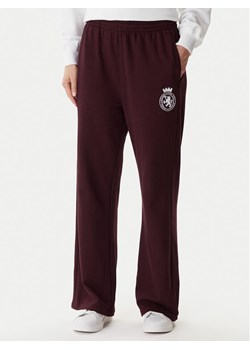 Tommy Hilfiger Spodnie dresowe UW0UW06081 Bordowy Wide Leg ze sklepu MODIVO w kategorii Spodnie damskie - zdjęcie 186030393