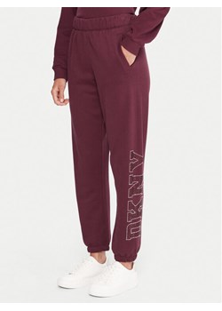 DKNY Sport Spodnie dresowe DP5P3737 Bordowy Regular Fit ze sklepu MODIVO w kategorii Spodnie damskie - zdjęcie 186030840