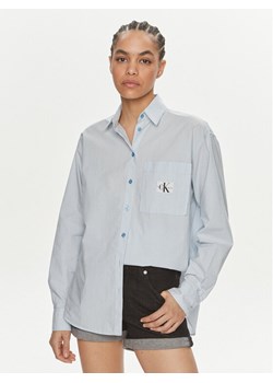 Calvin Klein Jeans Koszula J20J222610 Niebieski Relaxed Fit ze sklepu MODIVO w kategorii Koszule damskie - zdjęcie 186032251