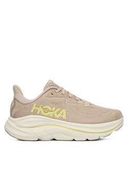 Hoka Buty do biegania Clifton 10 1162030 Beżowy ze sklepu MODIVO w kategorii Buty sportowe męskie - zdjęcie 186032390
