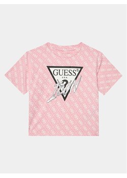 Guess T-Shirt J4RI06 K6YW3 Różowy Boxy Fit ze sklepu MODIVO w kategorii Bluzki dziewczęce - zdjęcie 186032643