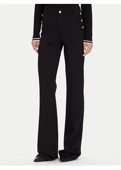Guess Spodnie materiałowe W5BB16 KCMU2 Czarny Flare Fit ze sklepu MODIVO w kategorii Spodnie damskie - zdjęcie 186032903