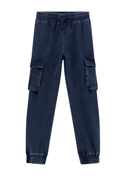 Guess Joggery L5YQ14 KCYC0 Granatowy Regular Fit ze sklepu MODIVO w kategorii Spodnie chłopięce - zdjęcie 186033460