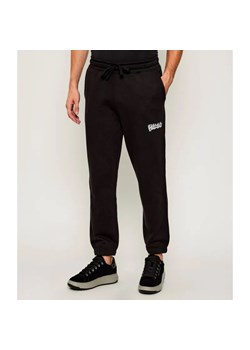 Hugo Blue Spodnie dresowe Nyrotro | Loose fit ze sklepu Gomez Fashion Store w kategorii Spodnie męskie - zdjęcie 186067844