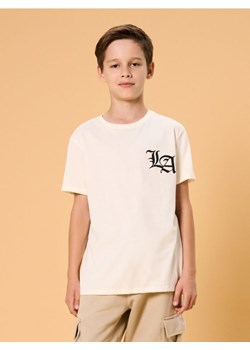 Sinsay - Bawełniana koszulka z nadrukiem - kremowy ze sklepu Sinsay w kategorii T-shirty chłopięce - zdjęcie 186084260