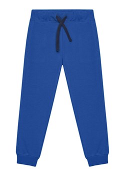 United Colors Of Benetton Spodnie dresowe 3J68CF058 Niebieski Regular Fit ze sklepu MODIVO w kategorii Spodnie chłopięce - zdjęcie 186086880