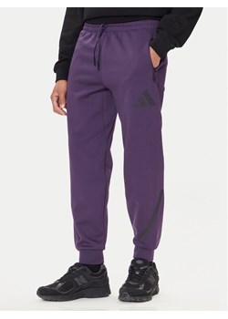 adidas Spodnie dresowe Z.N.E. JW4726 Fioletowy Loose Fit ze sklepu MODIVO w kategorii Spodnie męskie - zdjęcie 186096511