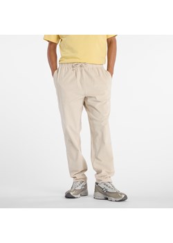 Spodnie męskie New Balance MP53521TWF – beżowe ze sklepu New Balance Poland w kategorii Spodnie męskie - zdjęcie 186126042
