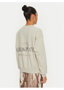 Champion Bluza 117494 Écru Loose Fit ze sklepu MODIVO w kategorii Bluzy damskie - zdjęcie 186140744