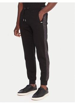 KARL LAGERFELD Spodnie dresowe 705036 554910 Czarny Slim Fit ze sklepu MODIVO w kategorii Spodnie męskie - zdjęcie 186151372