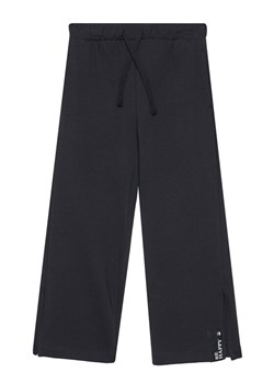 United Colors Of Benetton Spodnie dresowe 3NBMCF06K Czarny Relaxed Fit ze sklepu MODIVO w kategorii Spodnie dziewczęce - zdjęcie 186151521