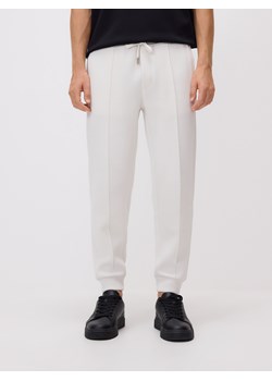 Reserved - Spodnie dresowe slim fit - złamana biel ze sklepu Reserved w kategorii Spodnie męskie - zdjęcie 186183650