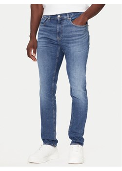 Tommy Jeans Jeansy DM0DM22203 Niebieski Slim Fit ze sklepu MODIVO w kategorii Jeansy męskie - zdjęcie 186200472