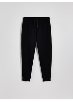 Reserved - Bawełniane spodnie dresowe - czarny ze sklepu Reserved w kategorii Spodnie męskie - zdjęcie 186214460