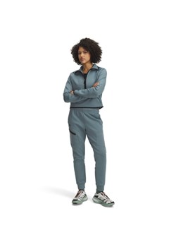 Damskie spodnie treningowe Under Armour Unstoppable Flc Jogger - niebieskie ze sklepu Sportstylestory.com w kategorii Spodnie damskie - zdjęcie 186230082
