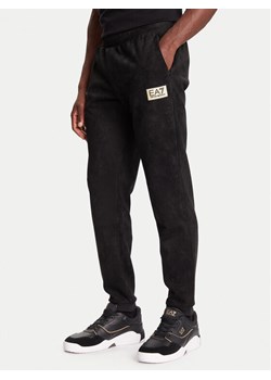 EA7 Emporio Armani Spodnie dresowe 7M000676 AF16718 UC001 Czarny Regular Fit ze sklepu MODIVO w kategorii Spodnie męskie - zdjęcie 186233861