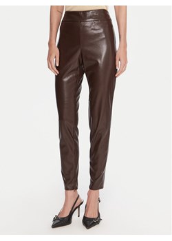 Guess Spodnie z imitacji skóry W4BB18 WGIK0 Czarny Slim Fit ze sklepu MODIVO w kategorii Spodnie damskie - zdjęcie 186245530