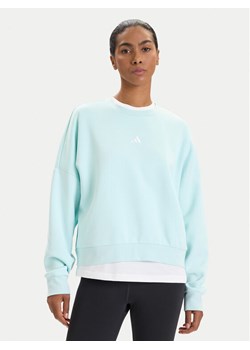 adidas Bluza Essentials Small Logo Feelcozy JV7300 Zielony Loose Fit ze sklepu MODIVO w kategorii Bluzy damskie - zdjęcie 186247904