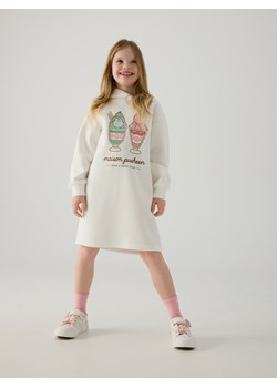 Reserved - Sukienka z pachnącym nadrukiem Pusheen - złamana biel ze sklepu Reserved w kategorii Sukienki dziewczęce - zdjęcie 186287730