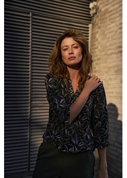Sweter z wzorem czarny ze sklepu Moodo.pl w kategorii Swetry damskie - zdjęcie 186321092
