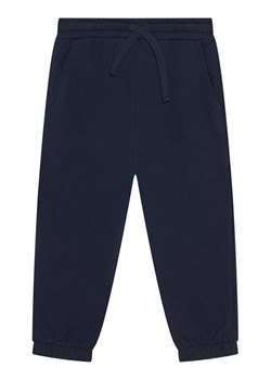 United Colors Of Benetton Spodnie dresowe 3J68GF04Z Granatowy Regular Fit ze sklepu MODIVO w kategorii Spodnie chłopięce - zdjęcie 186375540
