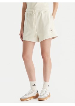 adidas by Stella McCartney Szorty sportowe True Casuals JX6786 Beżowy Loose Fit ze sklepu MODIVO w kategorii Szorty - zdjęcie 186450470