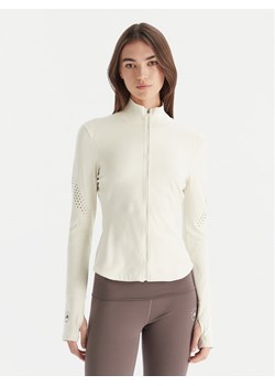 adidas by Stella McCartney Koszulka techniczna Training Midlayer JM1397 Beżowy Slim Fit ze sklepu MODIVO w kategorii Bluzki damskie - zdjęcie 186450513