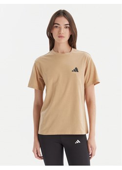 adidas T-Shirt City Tech Summer Graphic JV8600 Beżowy Regular Fit ze sklepu MODIVO w kategorii Bluzki damskie - zdjęcie 186450572