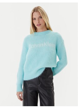 Calvin Klein Sweter LV044D359G Turkusowy Relaxed Fit ze sklepu MODIVO w kategorii Swetry damskie - zdjęcie 186450611