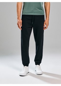 Sinsay - Spodnie regular fit - czarny ze sklepu Sinsay w kategorii Spodnie męskie - zdjęcie 186453600