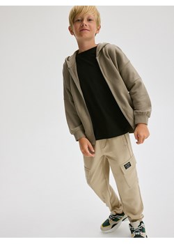 Reserved - Joggery cargo z kieszeniami - beżowy ze sklepu Reserved w kategorii Spodnie chłopięce - zdjęcie 186462861