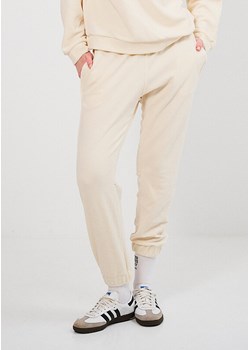 SPODNIE DAMSKIE Z LAMPASEM CASHMERE CREAM ze sklepu Jemiol w kategorii Spodnie damskie - zdjęcie 186536930