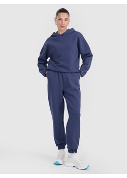 Damskie spodnie dresowe 4F 4FWAW25TTROF1184 - niebieskie ze sklepu Sportstylestory.com w kategorii Spodnie damskie - zdjęcie 186540551