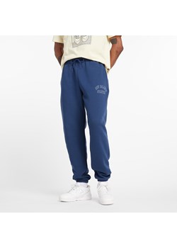 Spodnie męskie New Balance MP43505NNY – niebieskie ze sklepu New Balance Poland w kategorii Spodnie męskie - zdjęcie 186549350
