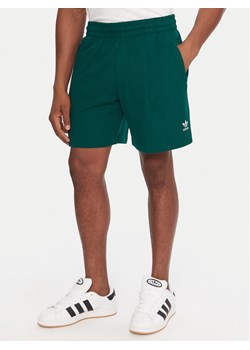 adidas Szorty sportowe Essentials Trefoil JW1040 Zielony Regular Fit ze sklepu MODIVO w kategorii Spodenki męskie - zdjęcie 186555934